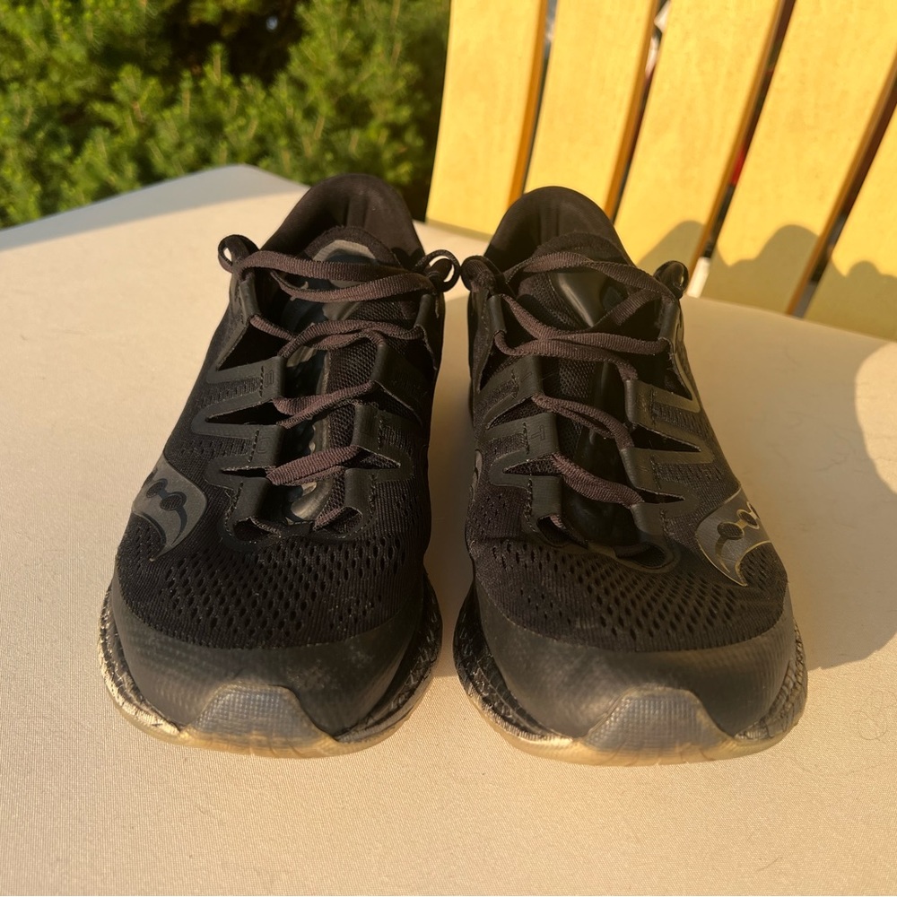 Men’s black Saucony Freedom ISO shoes.